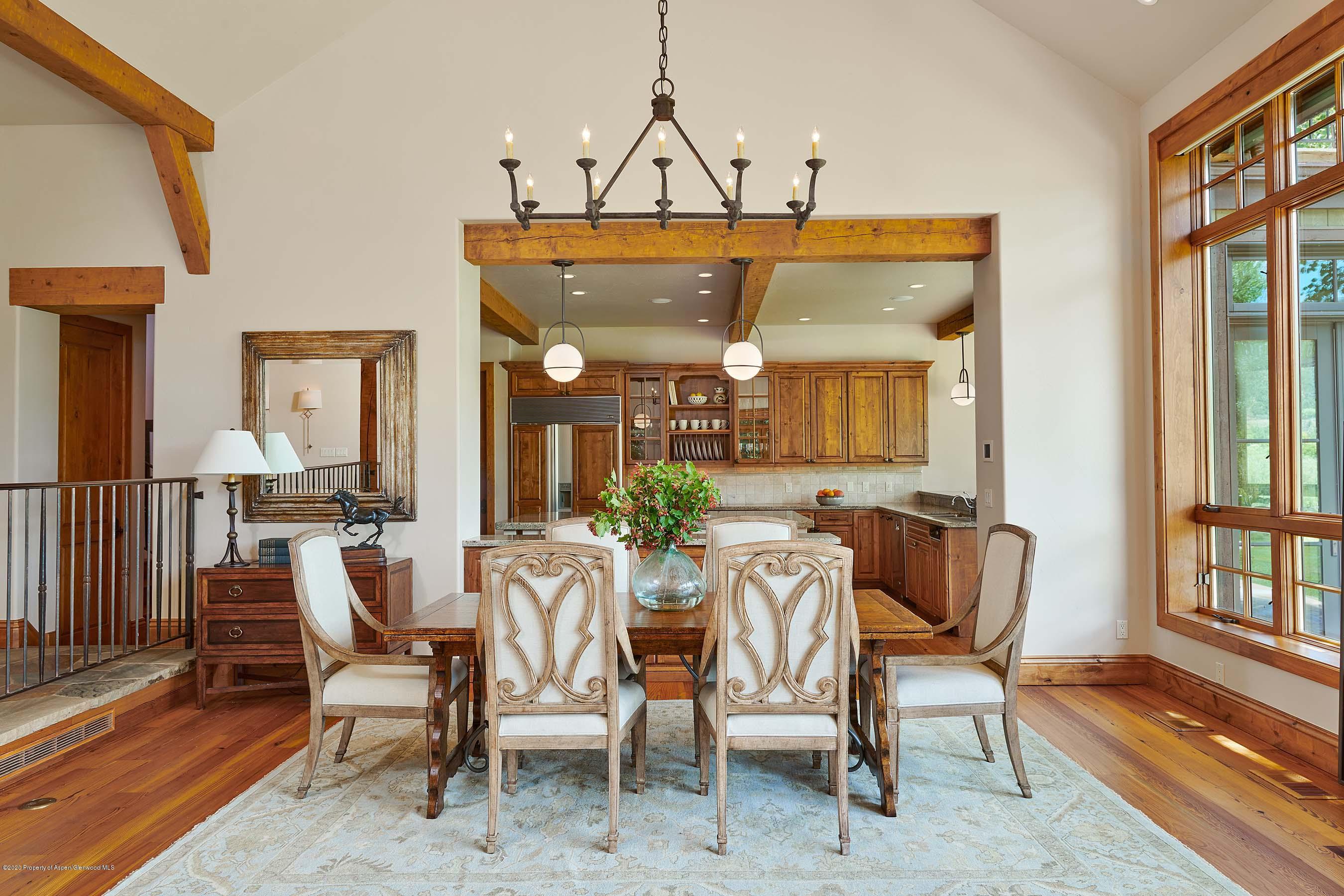 318 River's Bend Carbondale, CO 81623 - Photo 10 of 39 a view of a dining room with furniture and wooden floor