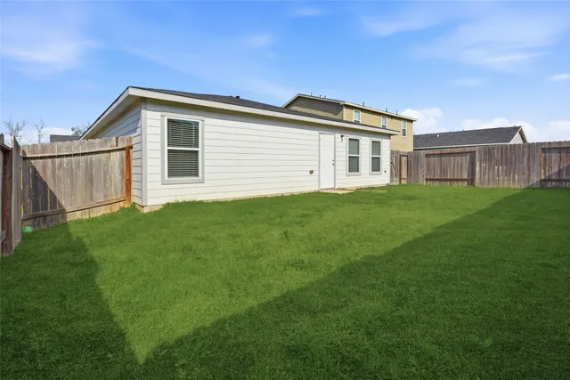 a house view with a garden space