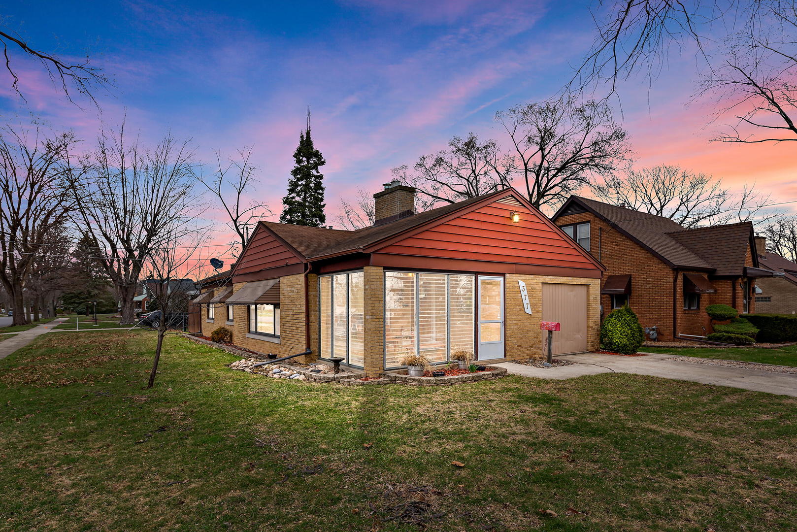 377 Cass Street Crete, IL 60417 - Photo 1 of 14 a front view of a house with a yard