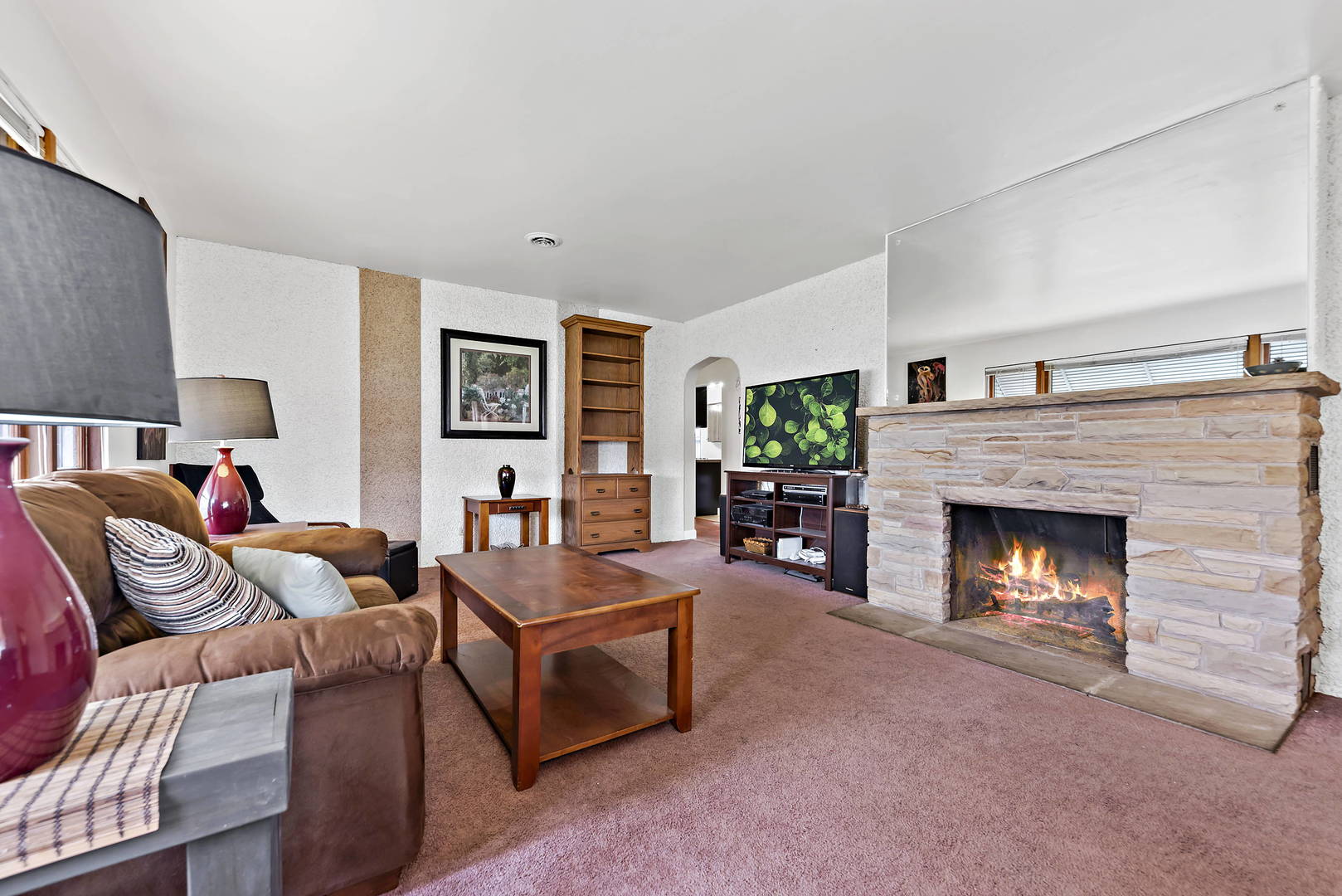 377 Cass Street Crete, IL 60417 - Photo 5 of 14 a living room with furniture and a fireplace