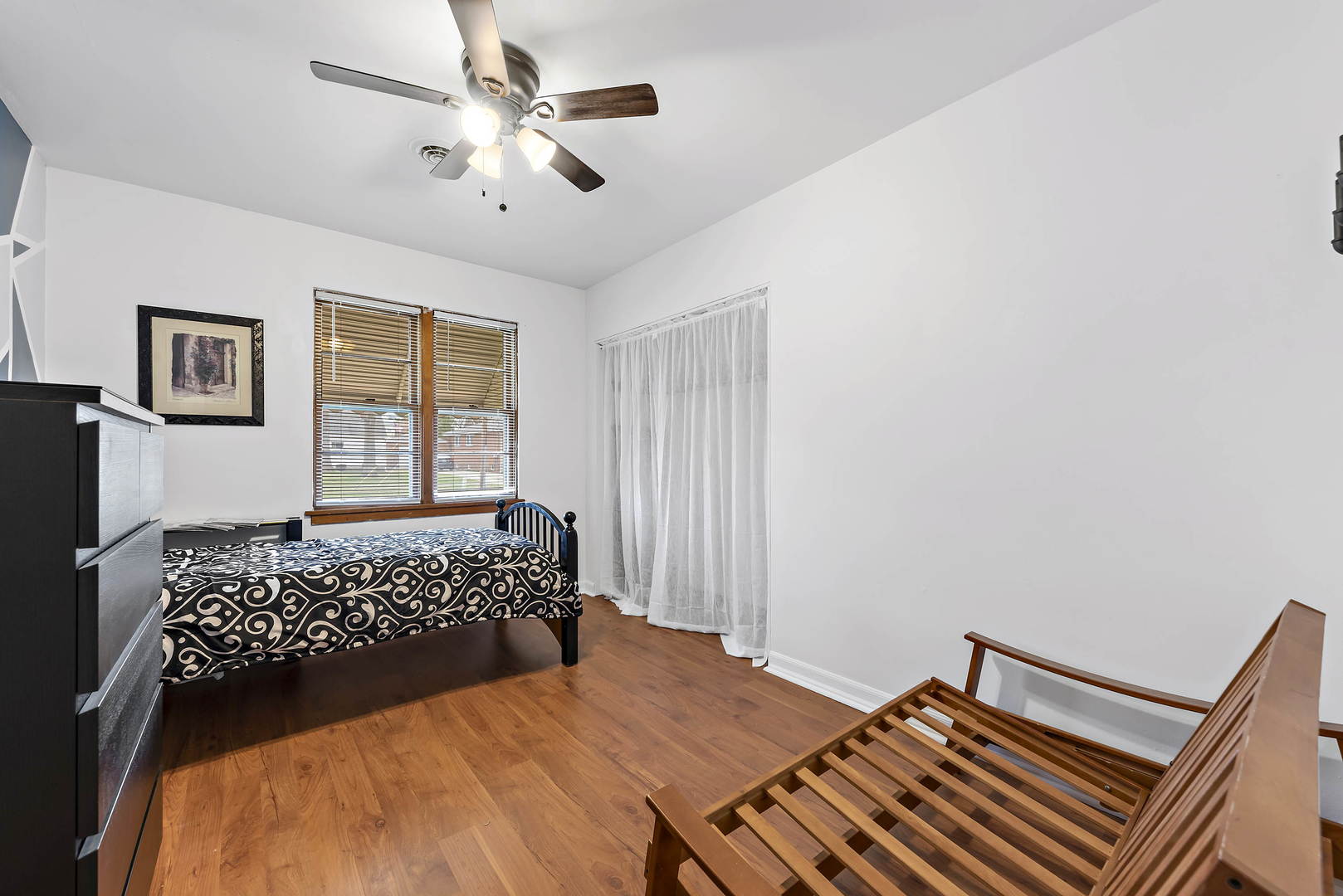 377 Cass Street Crete, IL 60417 - Photo 8 of 14 a bedroom with a bed and a window