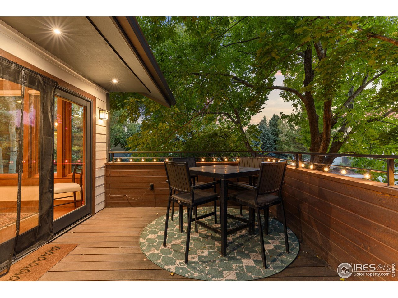 2545 Tamarack Avenue Boulder, CO 80304 - Photo 10 of 40 a view of a chairs and table in the balcony