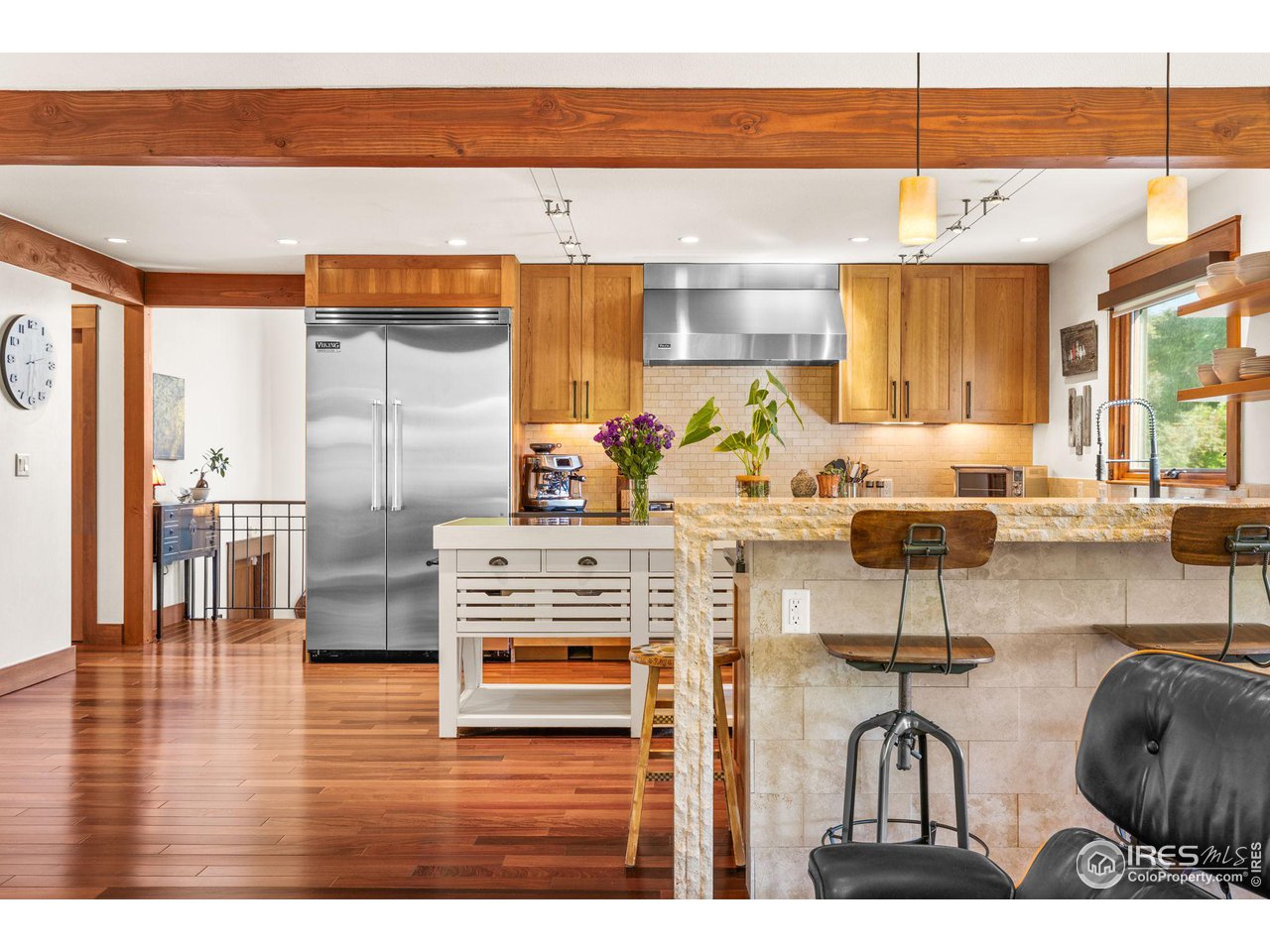 2545 Tamarack Avenue Boulder, CO 80304 - Photo 13 of 40 a living room with stainless steel appliances kitchen island granite countertop furniture and a large window
