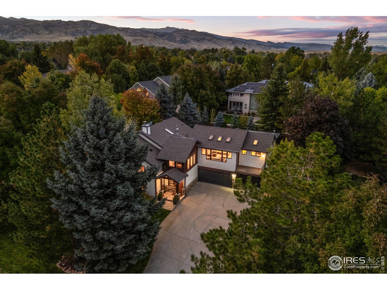 2545 Tamarack Avenue Boulder, CO 80304 - Photo 2 of 40 a view of a house with a mountain in the background