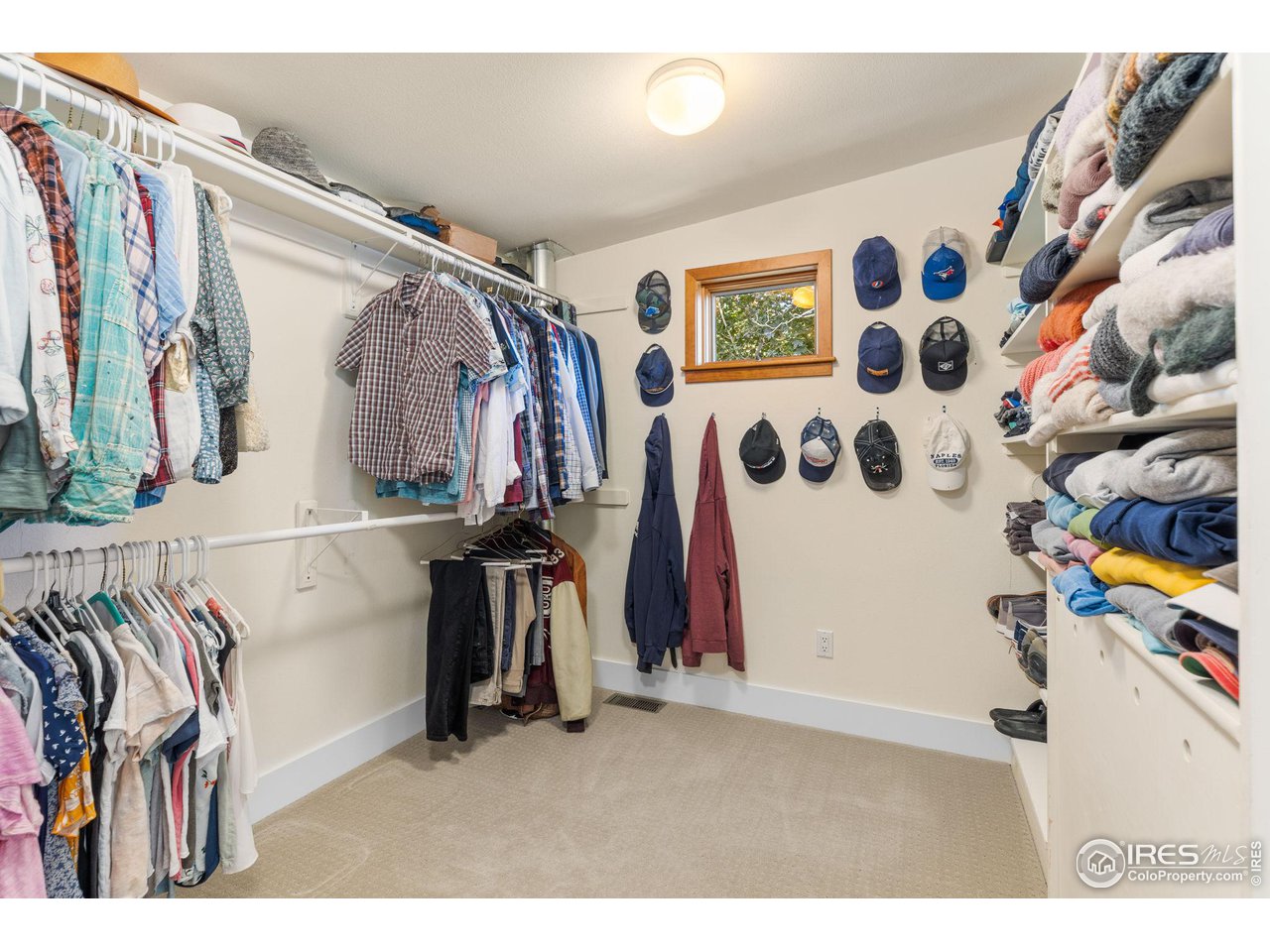 2545 Tamarack Avenue Boulder, CO 80304 - Photo 23 of 40 a view of walk in closet with clothes
