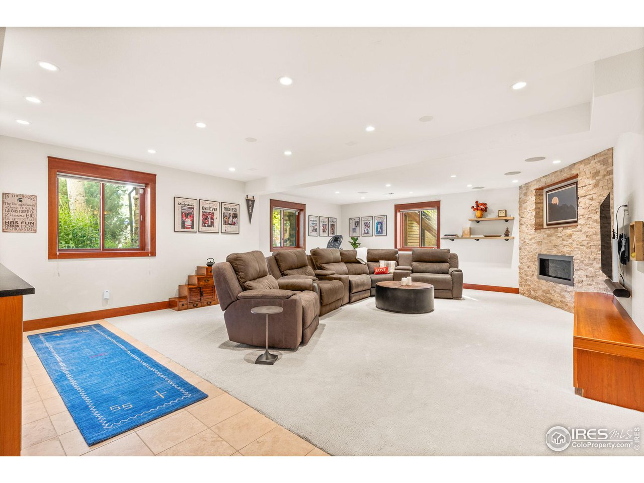 2545 Tamarack Avenue Boulder, CO 80304 - Photo 29 of 40 a living room with furniture and a flat screen tv
