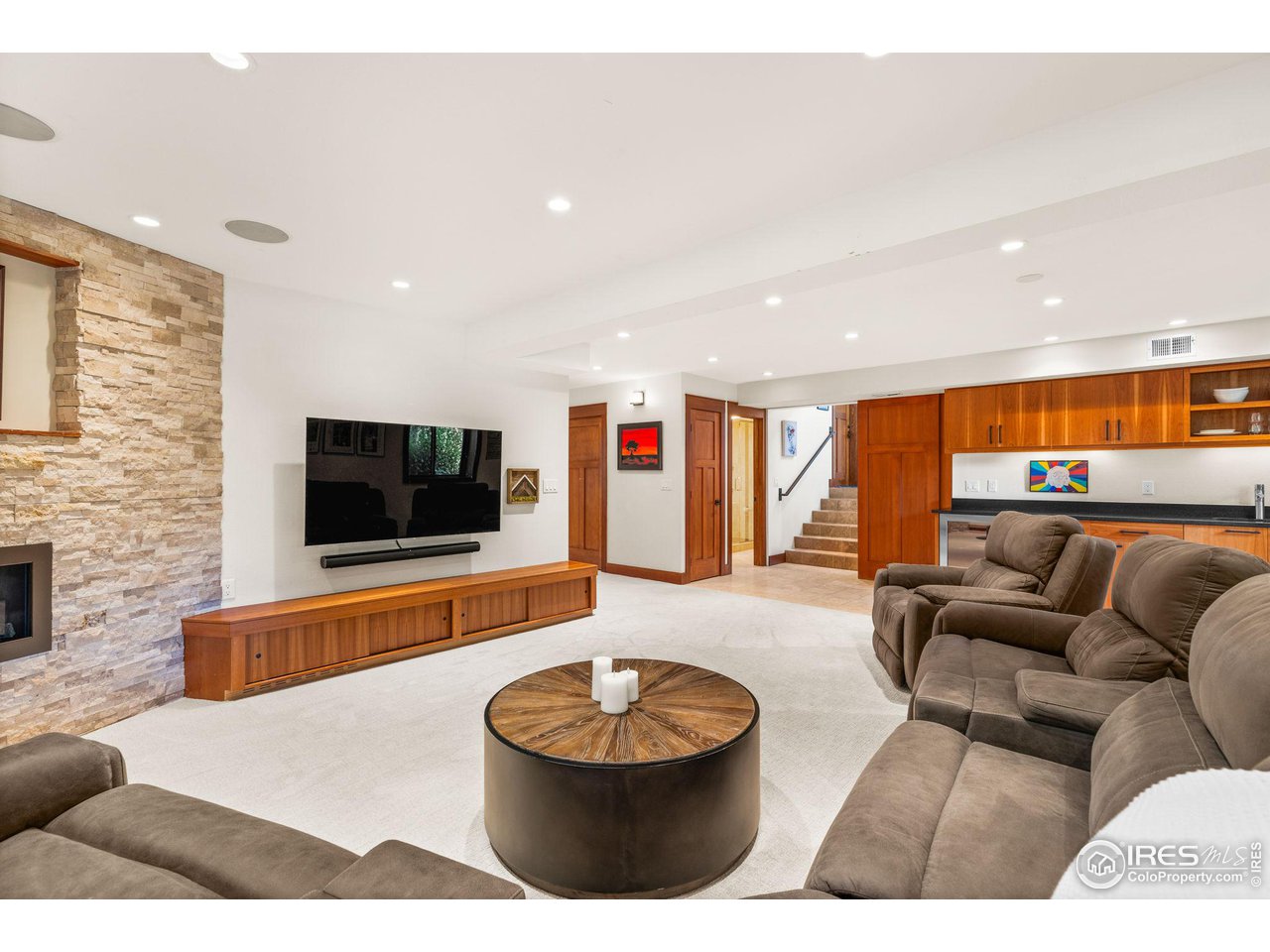 2545 Tamarack Avenue Boulder, CO 80304 - Photo 30 of 40 a living room with furniture and a flat screen tv