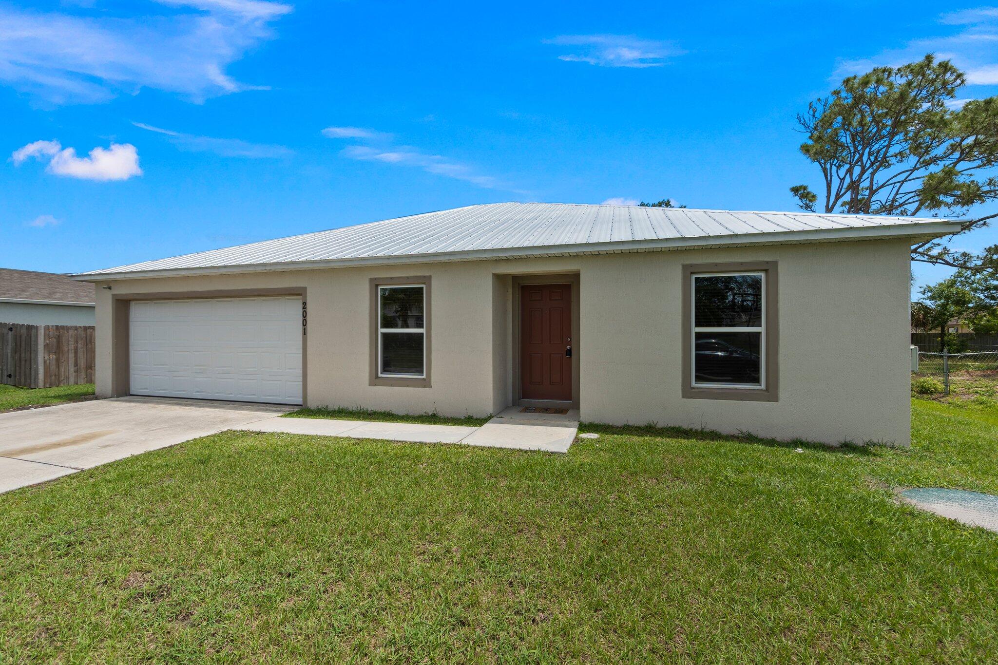 2001 Southwest Libra Lane Port St. Lucie, FL 34984 - Photo 2 of 29 3-web-or-mls-DSC04900