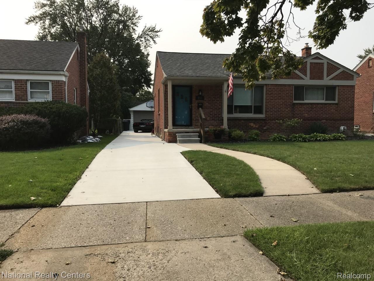 211 Normandy Road Royal Oak, MI 48073 - Photo 2 of 23 New driveway and apron provides side by side parking at rear