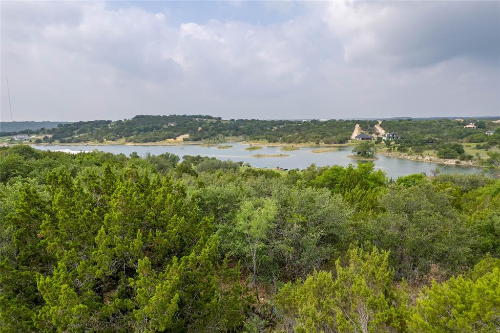 0 Anglers Point Bluff Dale, TX 76433 - Photo 11 of 35 a view of a lake with a city