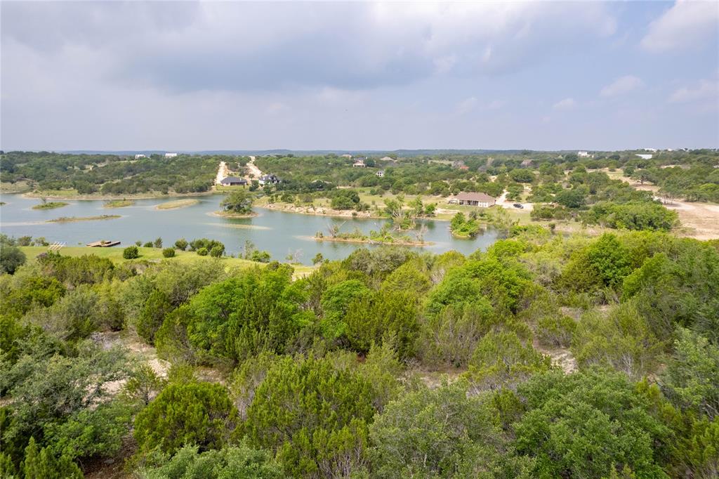 0 Anglers Point Bluff Dale, TX 76433 - Photo 14 of 35 a view of lake with houses in the background