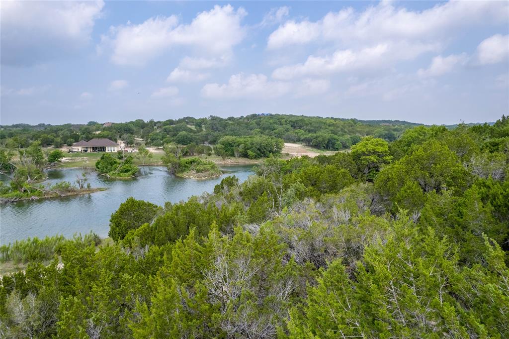 0 Anglers Point Bluff Dale, TX 76433 - Photo 24 of 35 a view of a lake with houses in back