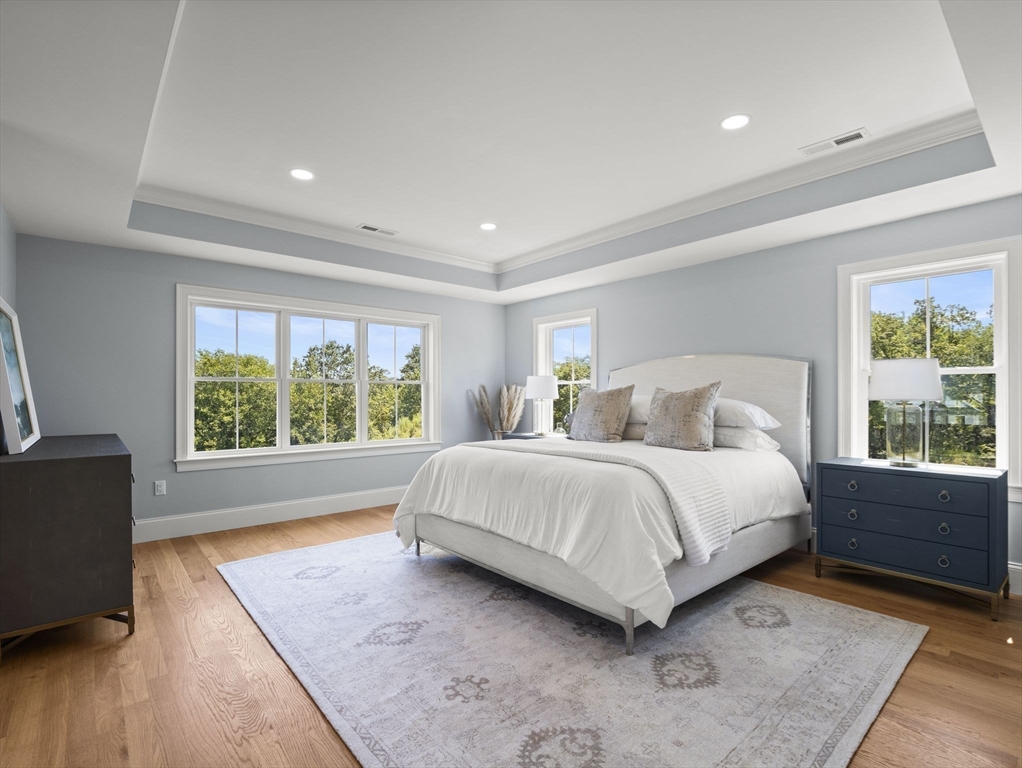 Lot 7 Weeping Willow Drive Andover, MA 01810 - Photo 18 of 42 a spacious bedroom with a large bed and a window