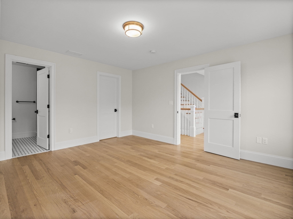 Lot 7 Weeping Willow Drive Andover, MA 01810 - Photo 23 of 42 a big room with wooden floor and natural light