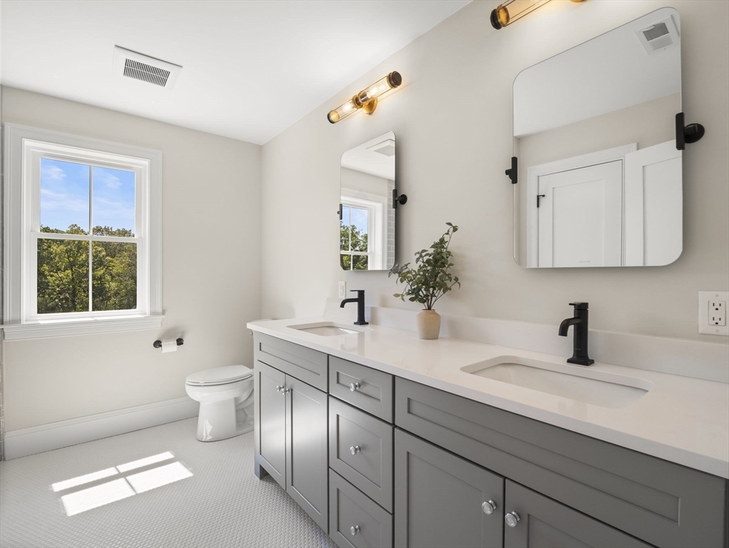 Lot 7 Weeping Willow Drive Andover, MA 01810 - Photo 25 of 42 a bathroom with a sink a toilet and mirror