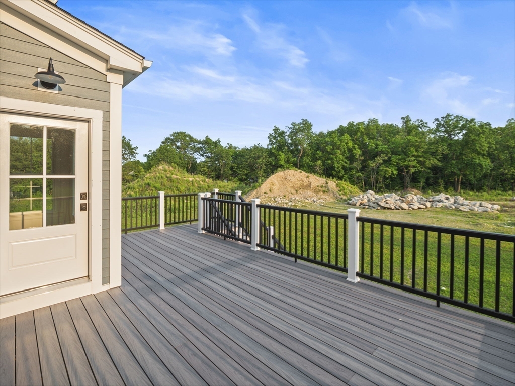 Lot 7 Weeping Willow Drive Andover, MA 01810 - Photo 40 of 42 a view of a balcony with wooden floor