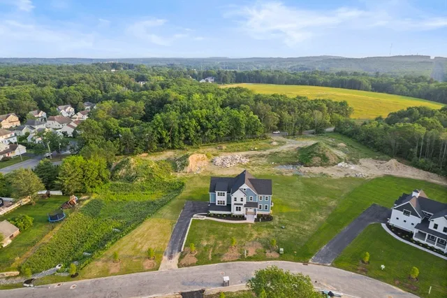 a view of a lake with a yard