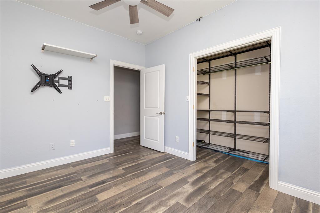 512 Milton Road Josephine, TX 75173 - Photo 22 of 31 an empty room with a empty space and a ceiling fan