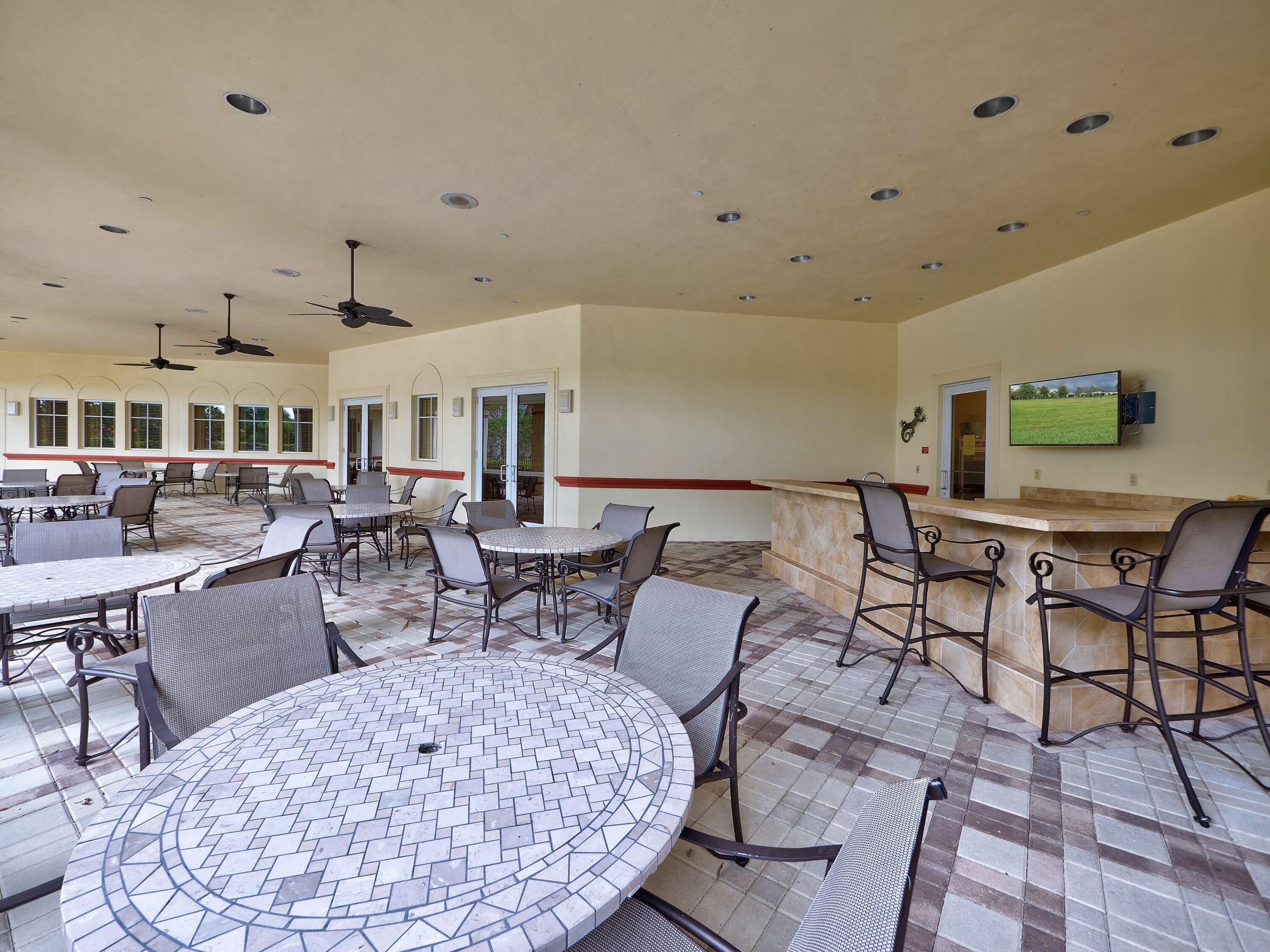 8608 Tompson Point Road Port St. Lucie, FL 34986 - Photo 41 of 50 8 - Outdoor kitchen
