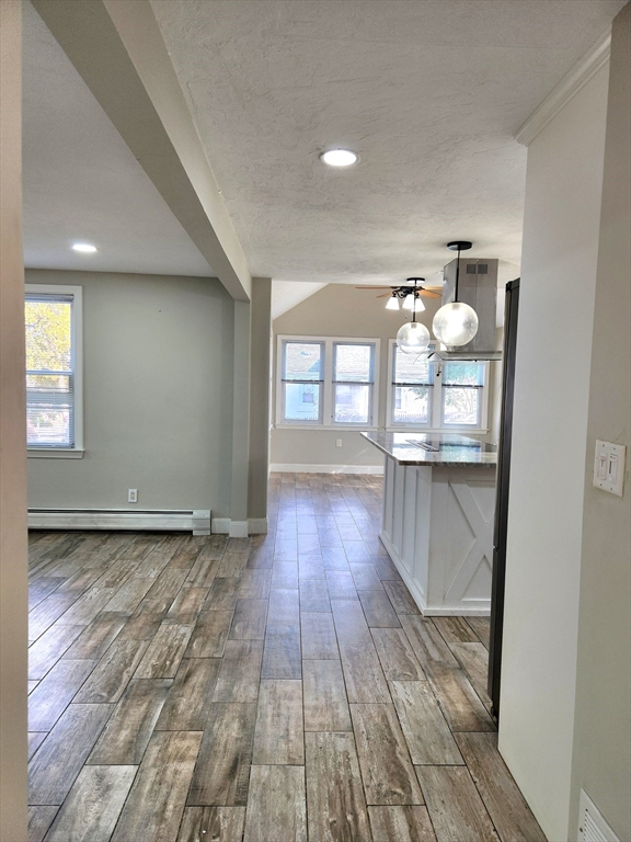 42 Ancona Road Worcester, MA 01604 - Photo 12 of 42 a view of empty room with wooden floor