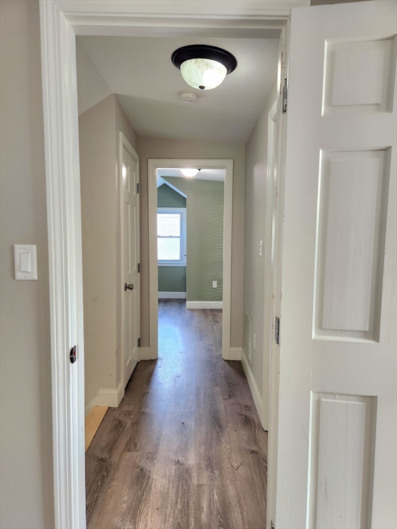 42 Ancona Road Worcester, MA 01604 - Photo 28 of 42 a view of a hallway with wooden floor