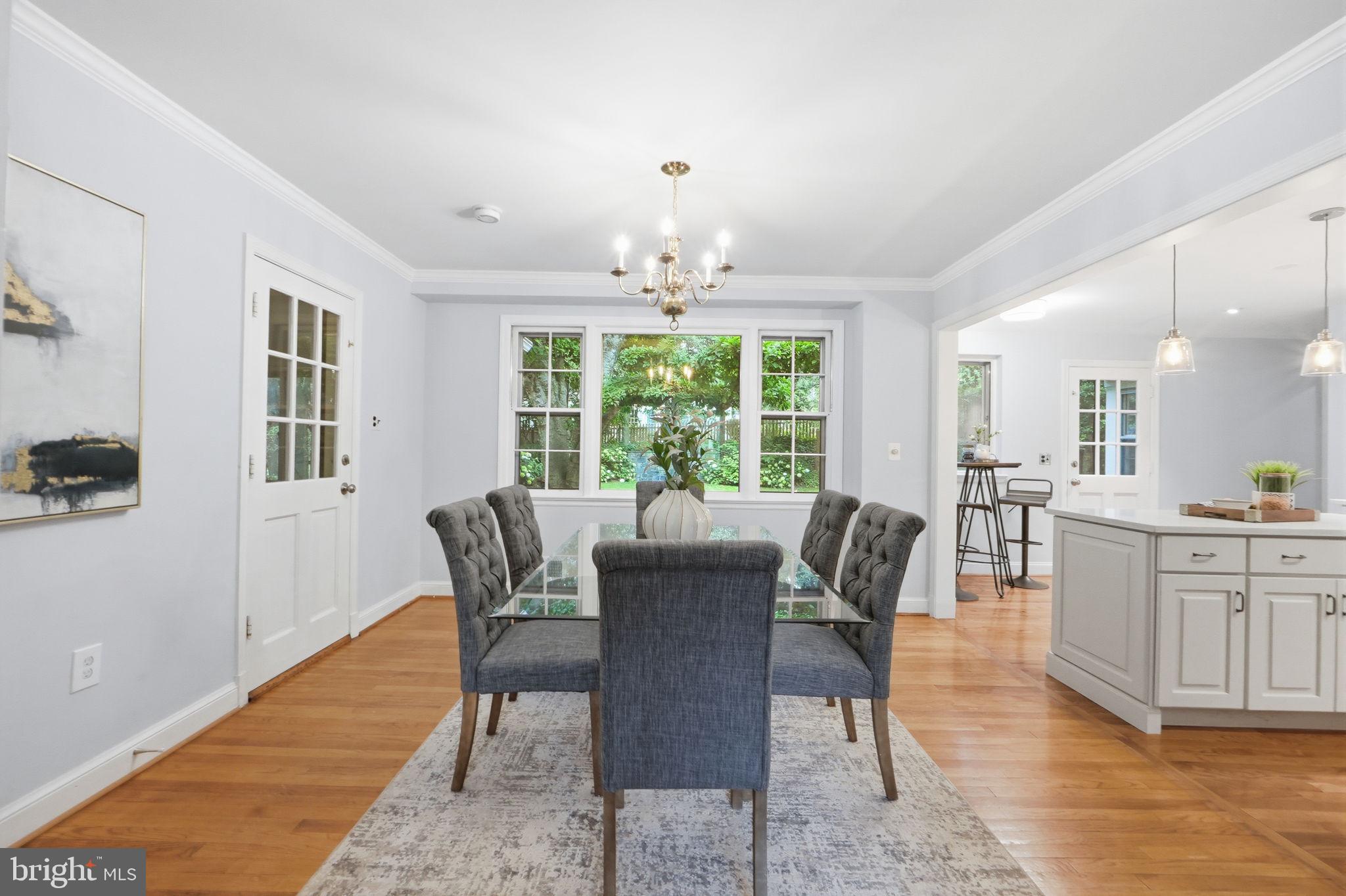 5910 Overlea Road Bethesda, MD 20816 - Photo 8 of 56 a view of a dining room with furniture window and outside view