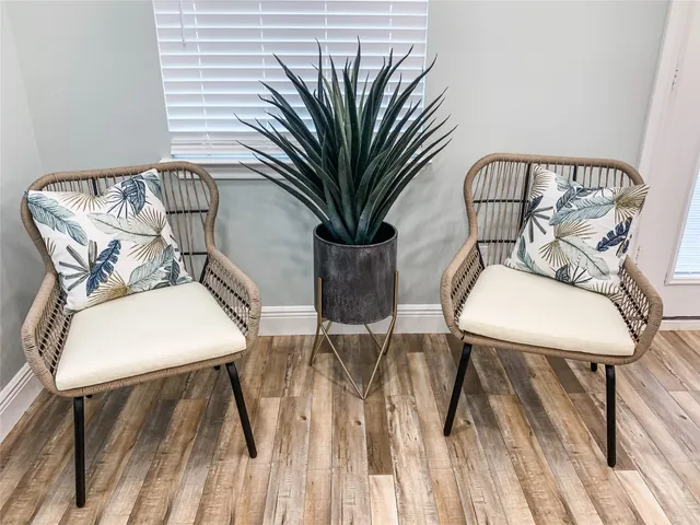 a view of balcony with furniture