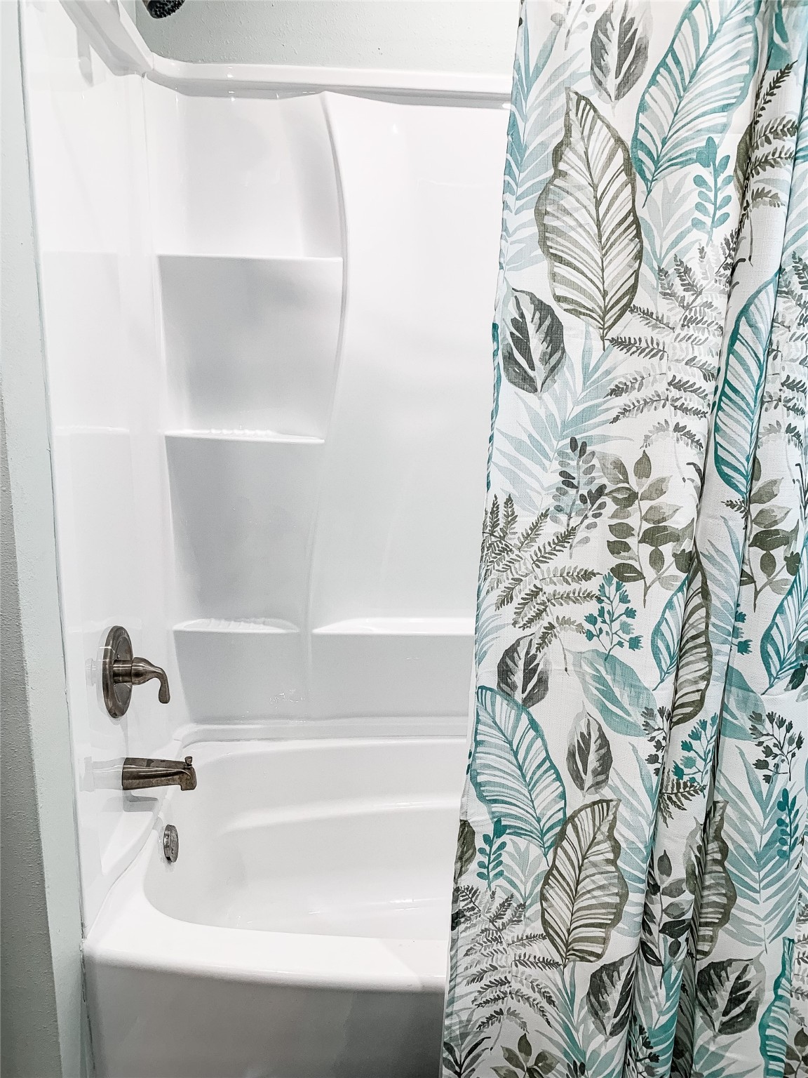 246 Seagull Road Sargent, TX 77414 - Photo 23 of 25 a bathroom with a bathtub and shower