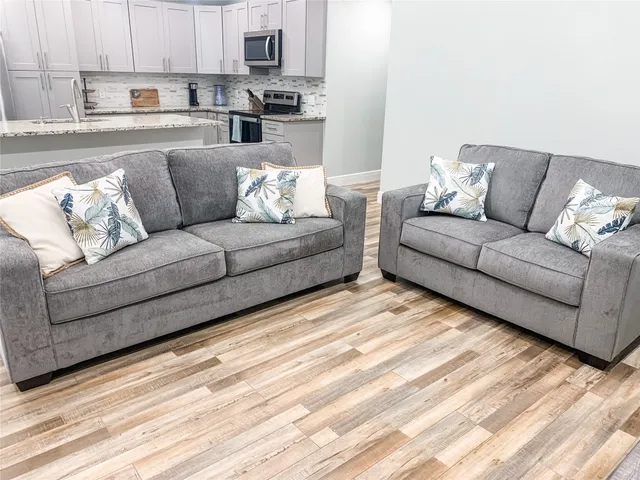 a living room with furniture and a couch
