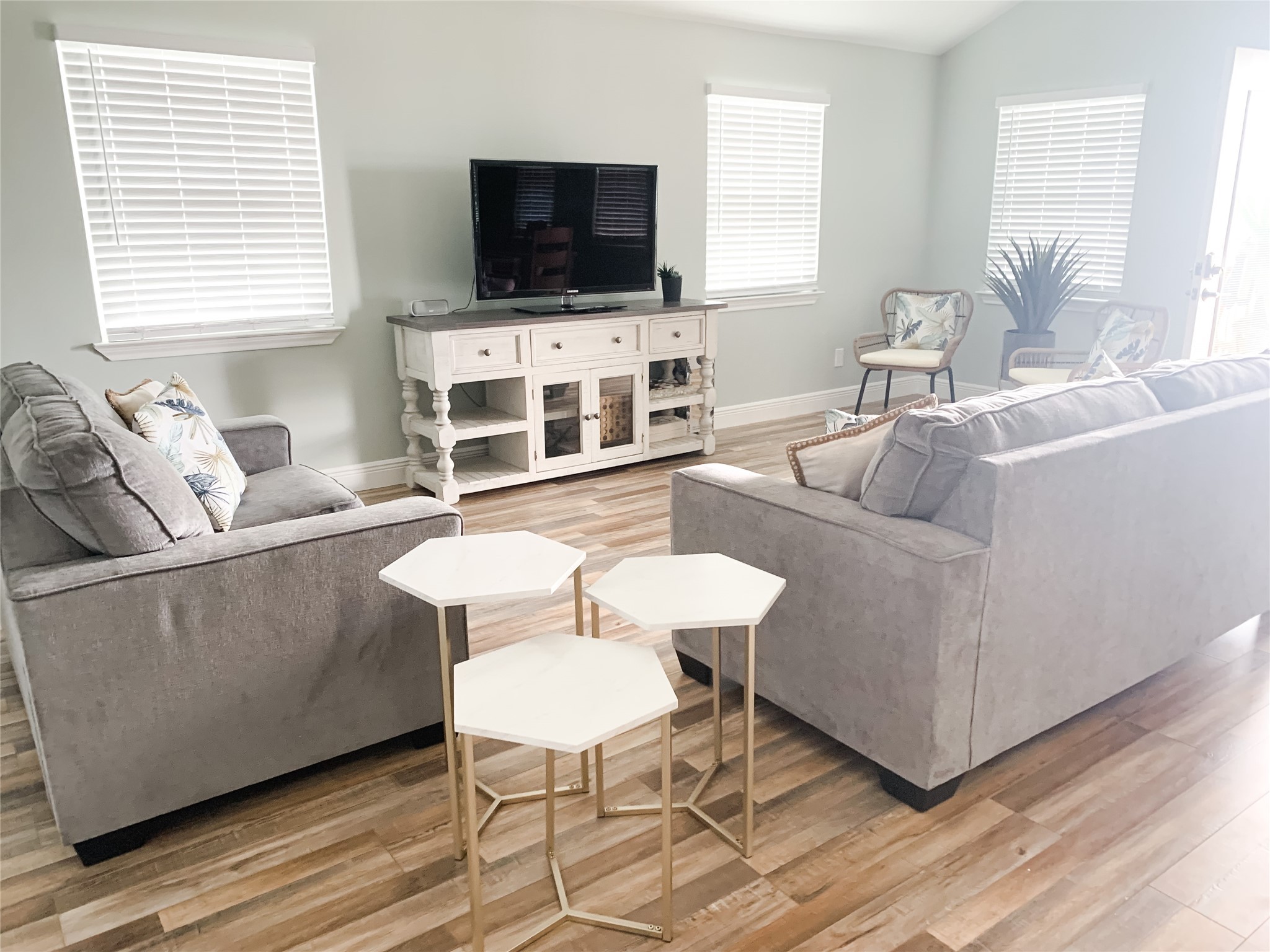 246 Seagull Road Sargent, TX 77414 - Photo 5 of 25 a living room with furniture and a flat screen tv