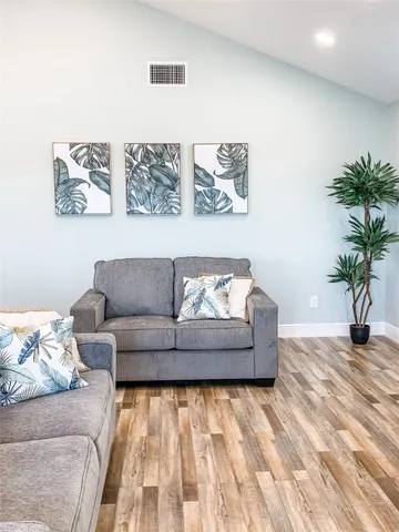 a living room with furniture and a couch