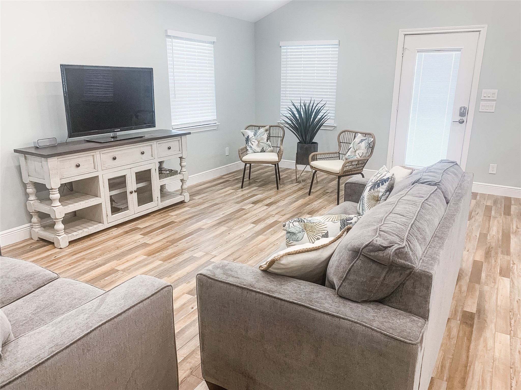 246 Seagull Road Sargent, TX 77414 - Photo 9 of 25 a living room with furniture and a flat screen tv