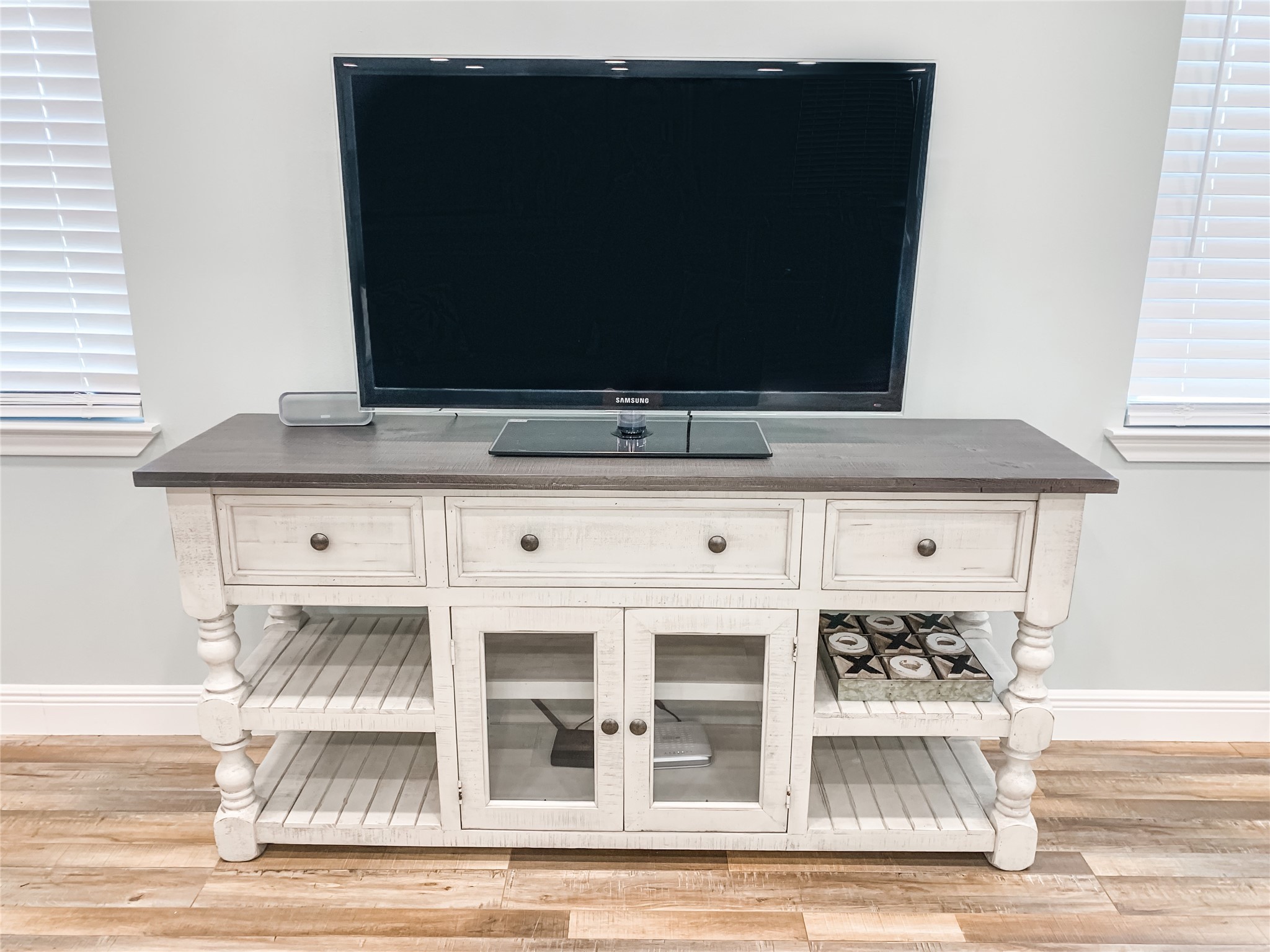 246 Seagull Road Sargent, TX 77414 - Photo 10 of 25 a living room with a flat screen tv and a fireplace