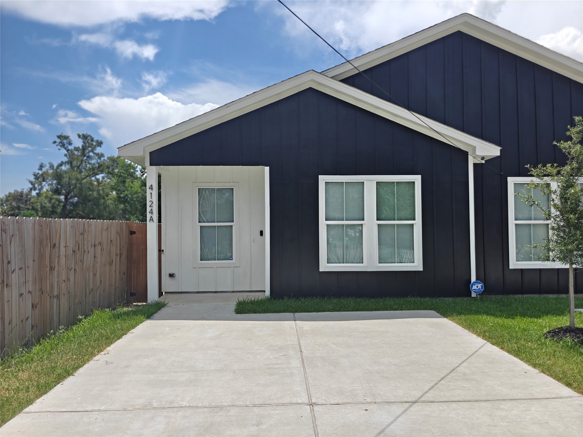 4124 Vaughn Street, Unit A Houston, TX 77016 - Photo 2 of 17 a front view of a house having yard