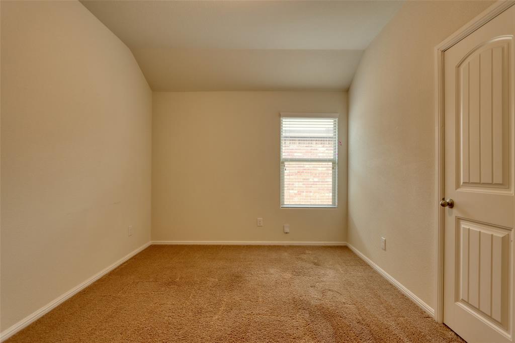 744 Walls Boulevard Crowley, TX 76036 - Photo 20 of 28 an empty room with a window