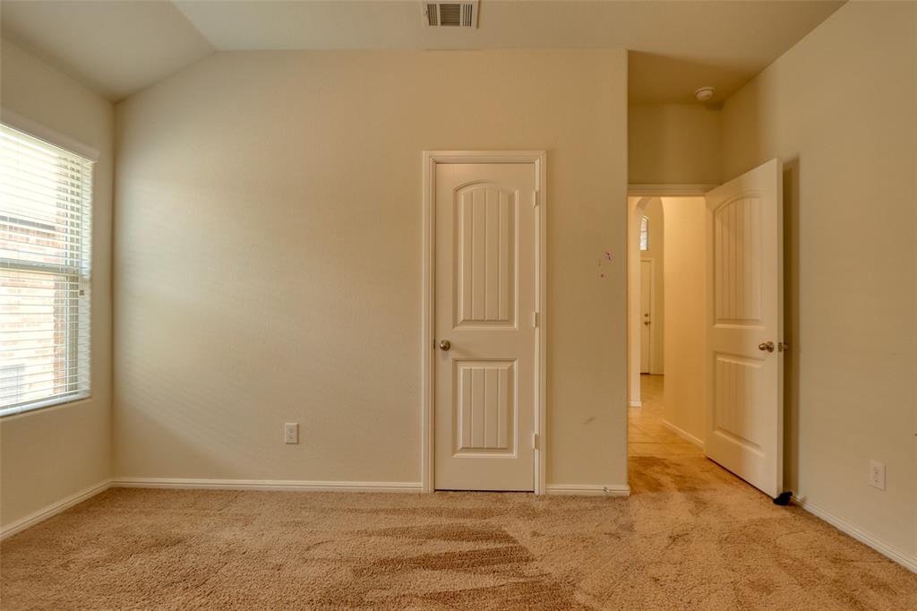 744 Walls Boulevard Crowley, TX 76036 - Photo 21 of 28 an empty room with window