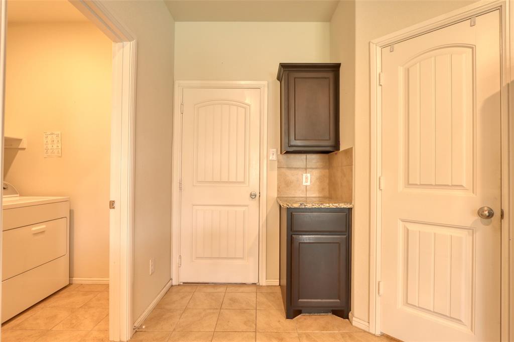 744 Walls Boulevard Crowley, TX 76036 - Photo 23 of 28 a bathroom with a sink