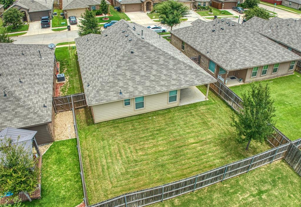 744 Walls Boulevard Crowley, TX 76036 - Photo 28 of 28 a aerial view of a house with a yard and large tree