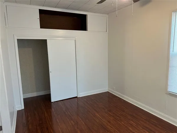a view of a livingroom with wooden floor