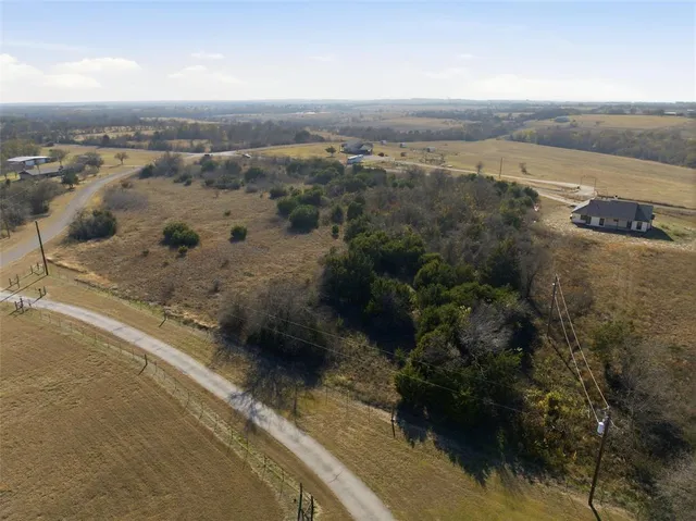 a view of lake with green space