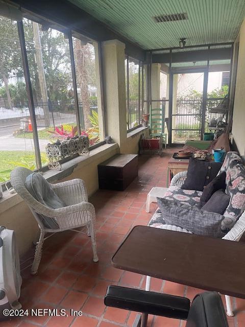 271 St George Street St. Augustine, FL 32084 - Photo 12 of 21 a living room with furniture and a large window