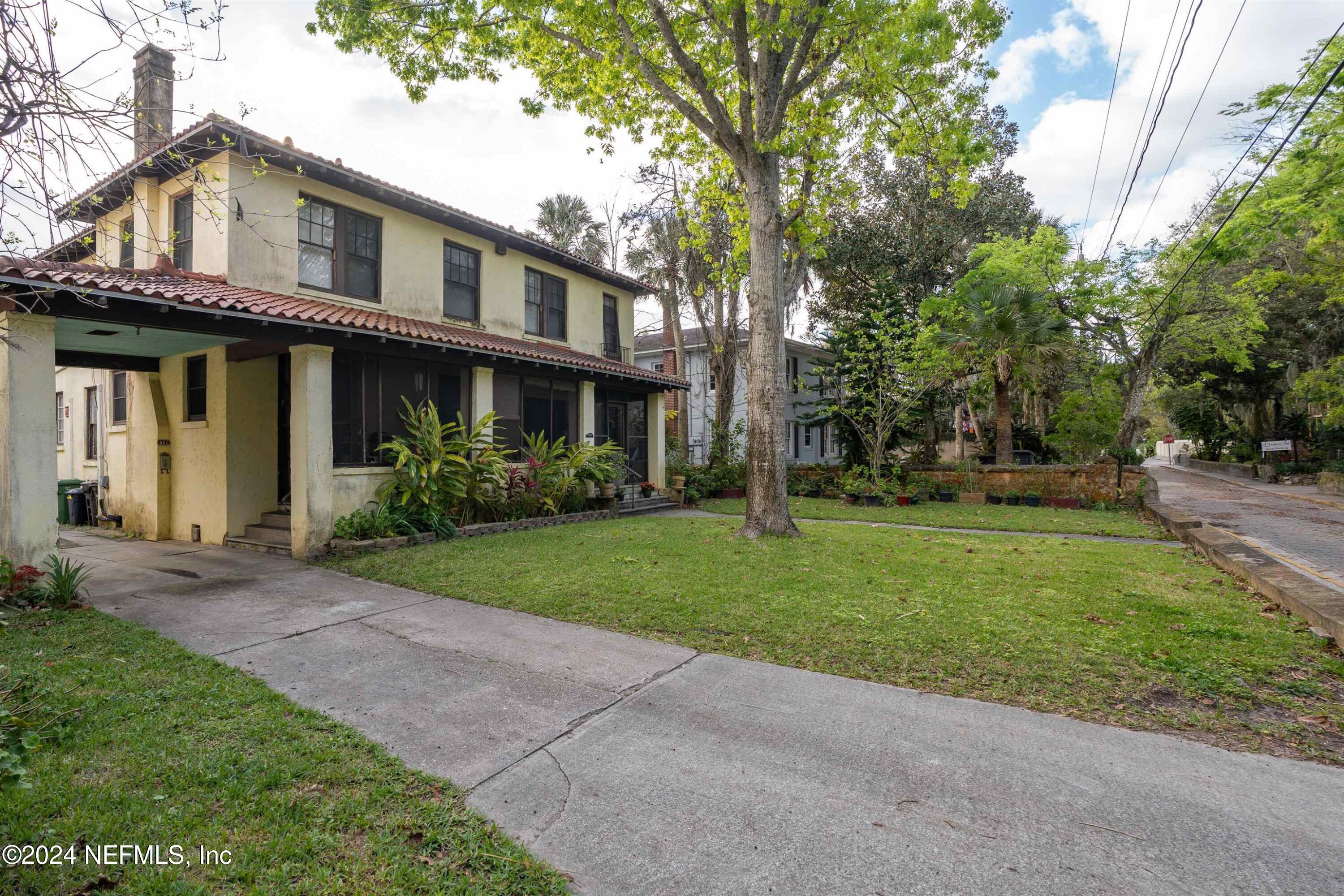 271 St George Street St. Augustine, FL 32084 - Photo 2 of 21 a front view of house with yard and green space