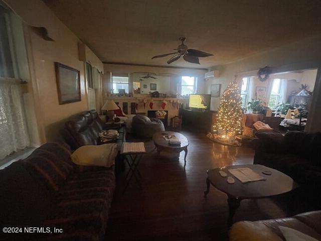 271 St George Street St. Augustine, FL 32084 - Photo 9 of 21 a living room with furniture and a chandelier