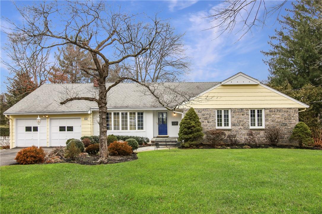 15 Rock Ridge Drive Rye Brook, NY 10573 - Photo 1 of 1 a front view of house with yard and green space