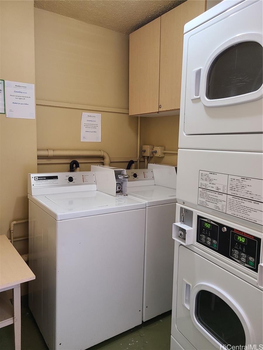 2442 Tusitala Street, Unit 210 Honolulu, HI 96815 - Photo 5 of 5 a utility room with dryer and washer