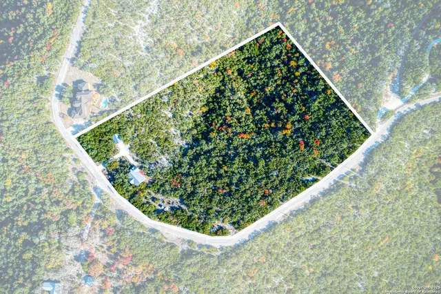 a view of a yard with an outdoor space