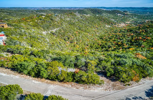 a view of a garden from a balcony