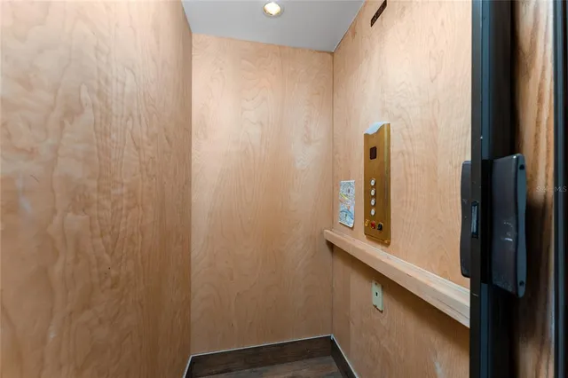 a view of a room with racks on the wall