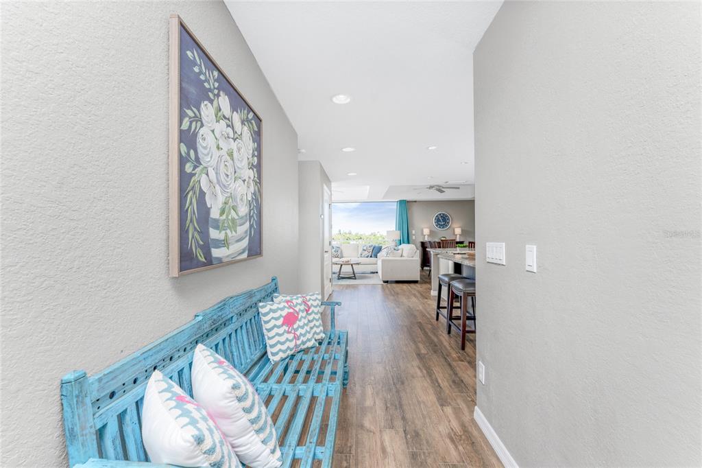 8013 Bay Point Drive Englewood, FL 34224 - Photo 44 of 82 a living room with furniture and a wooden floor