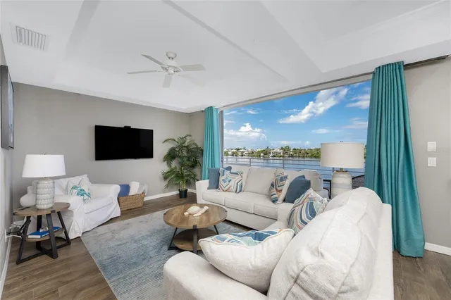 a kitchen with granite countertop a stove top oven and sink